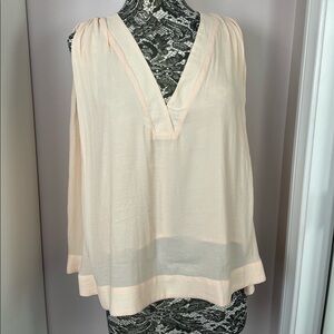 Free People peach colored top size medium.